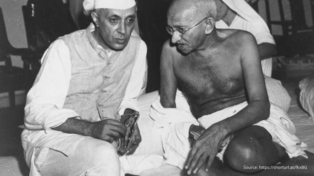 Mahatma Gandhi and Jawaharlal Nehru discussing at the All-India Congress Committee meeting